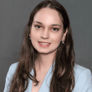 Professional headshot of Iris Khan