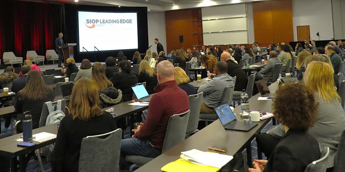 2024 LEC General Session - group of attendees watching a presentation