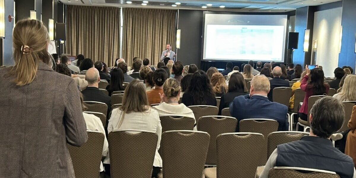 Audience attending a presentation at the Society for Industrial and Organizational Psychology confer.