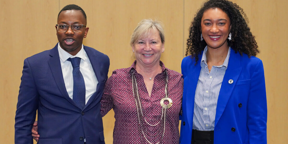 Three SIOP members posing for picture