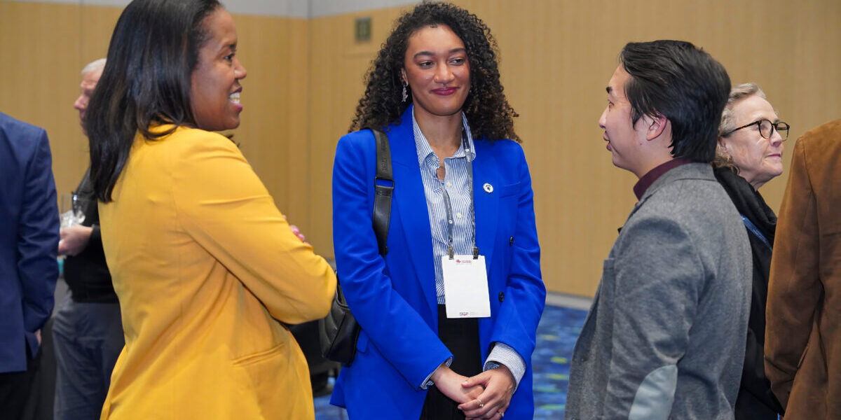 Three SIOP Members having a conversation