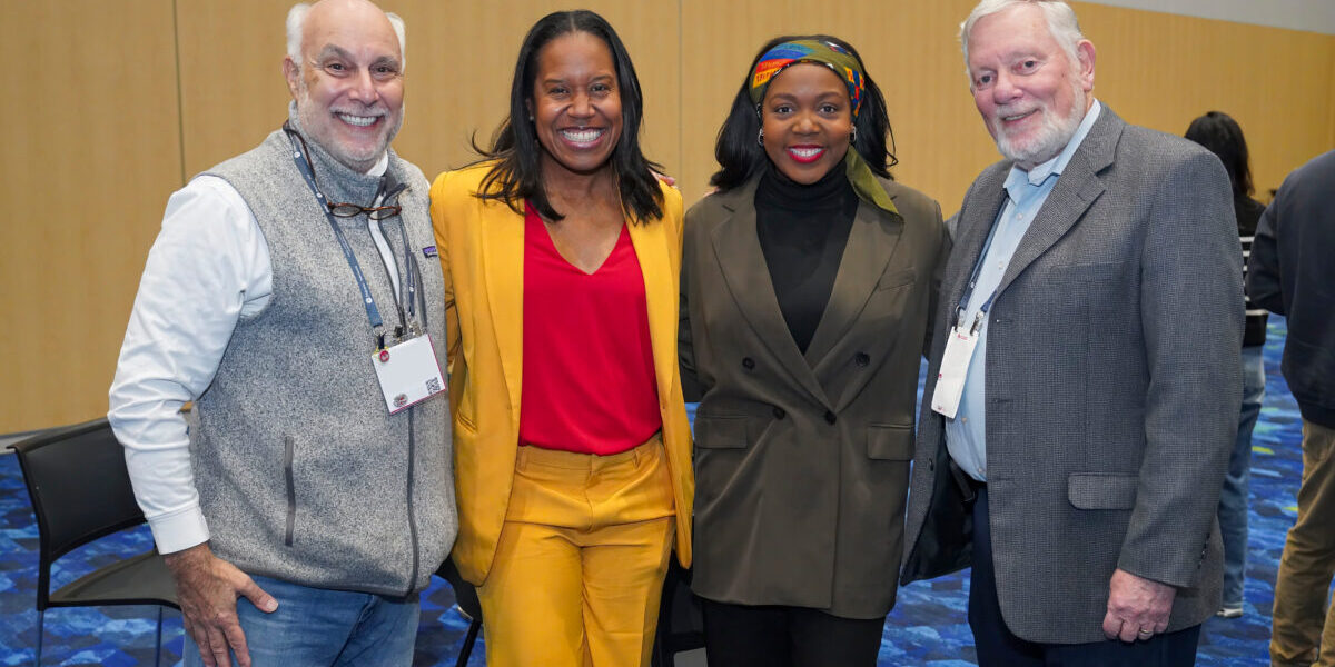 Four SIOP members posing for a photo