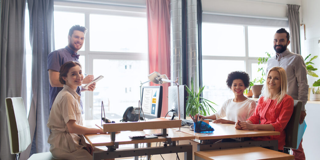 A group of startup professionals meeting around a table