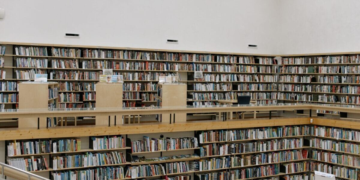 stacks of books in a library