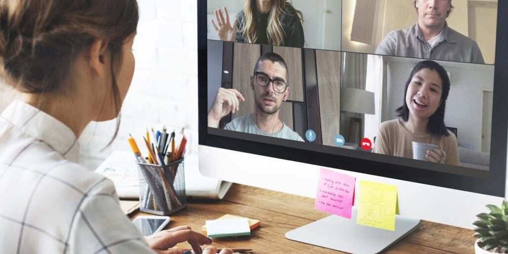 Woman in a video conference call in her home office
